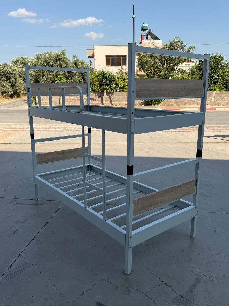 Light gray standard metal bunk bed stacked as a bunk
