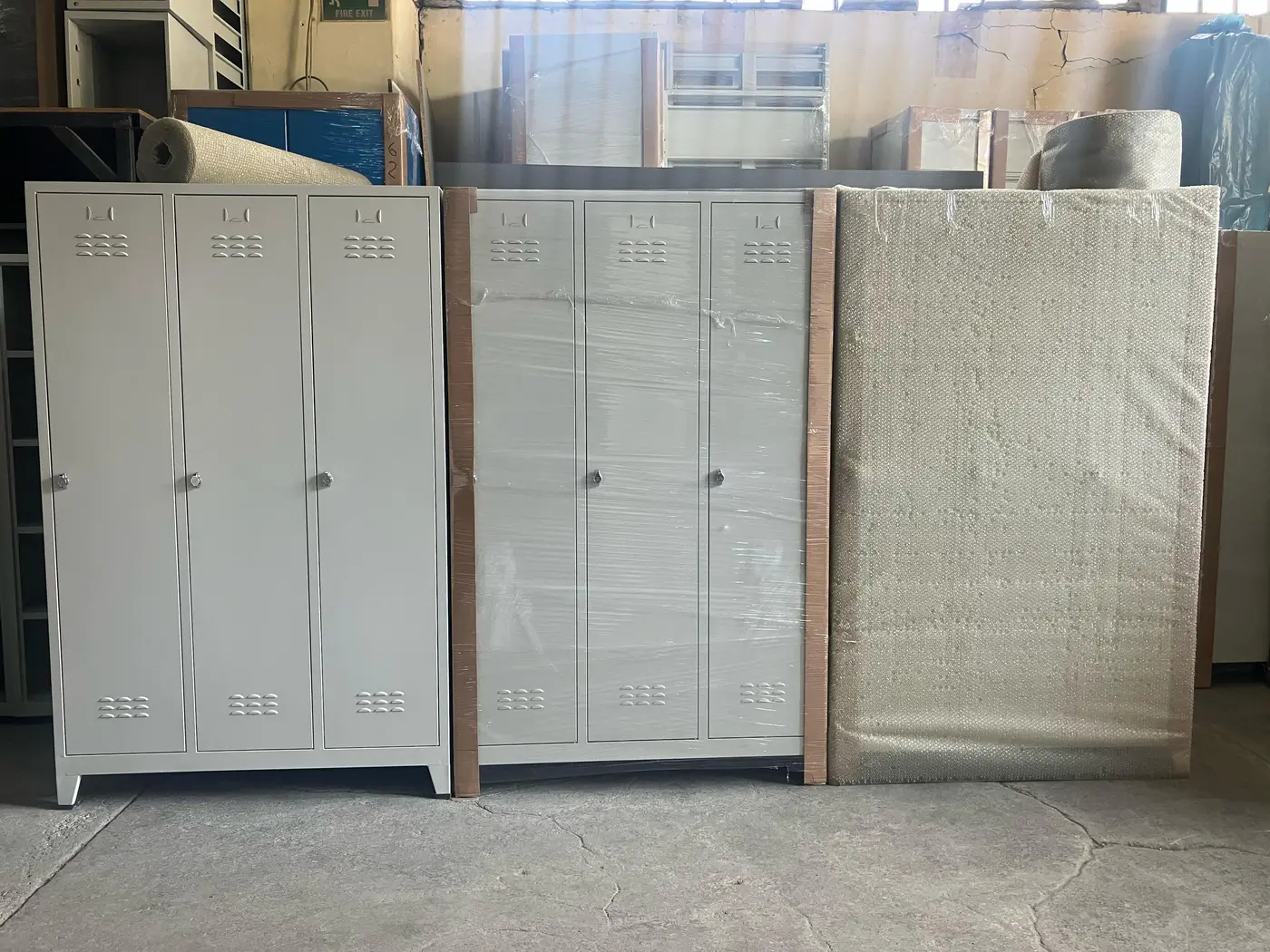 Steel units packed for export in three stages, bare, stretch-wrapped, then bubble-wrapped