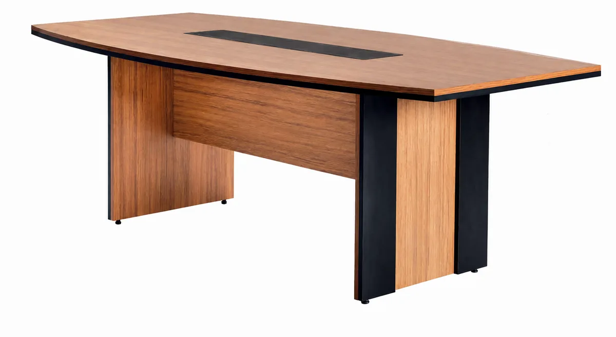 Office meeting table with a boat shaped top on panel legs, seen from an angle
