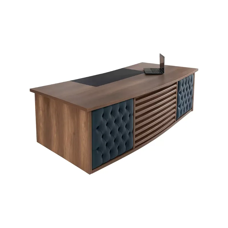 Executive office desk with upholstered side panels and a channelled front