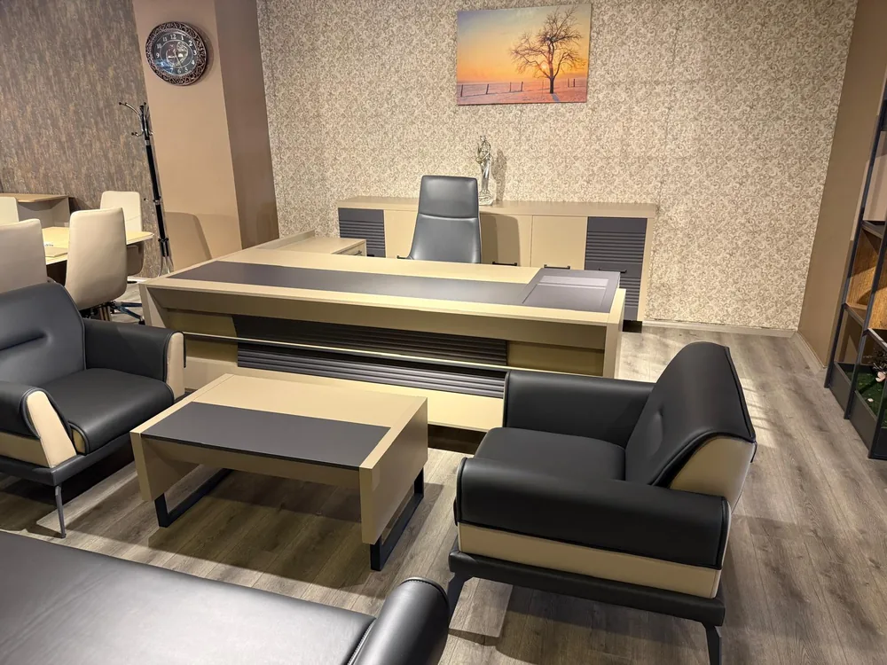 Executive office desk with an attached side unit, a six-door cabinet behind it, and a coffee table in front