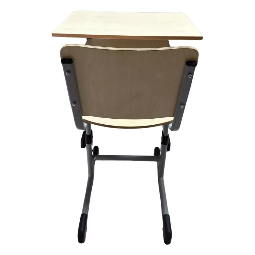 Height adjustable student desk seen from behind the seat